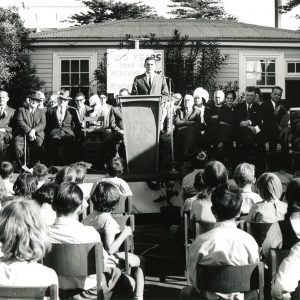 Assistant Education Minister Wal Fife speaking at 150th Anniversary assembly