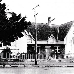 Photo of Tyrell Street entry, showing asbestos roofing